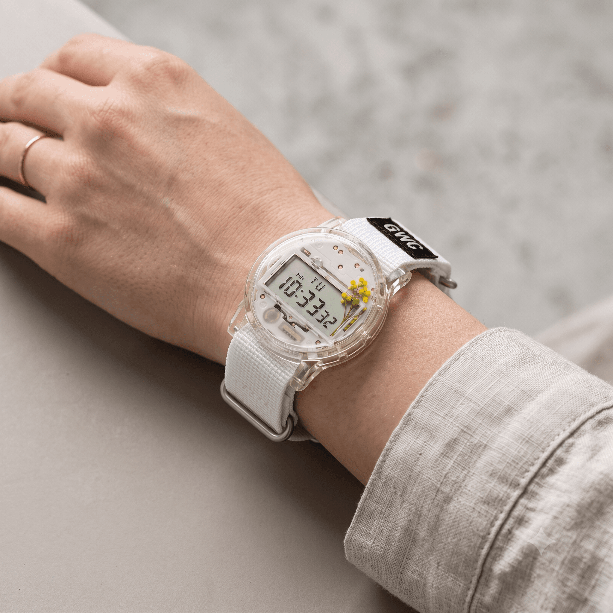 Close-up of the quartz movement sealed above the Homoyo Watch's resin case